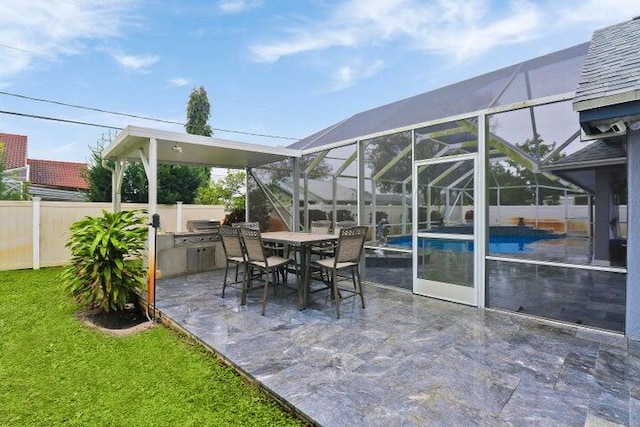 view of patio / terrace featuring glass enclosure and a fenced in pool