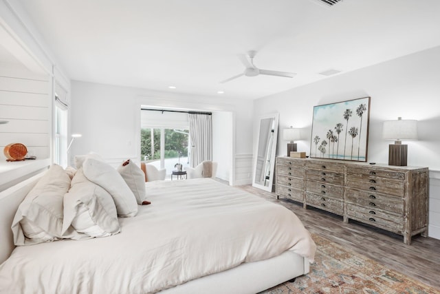 bedroom featuring hardwood / wood-style floors and ceiling fan