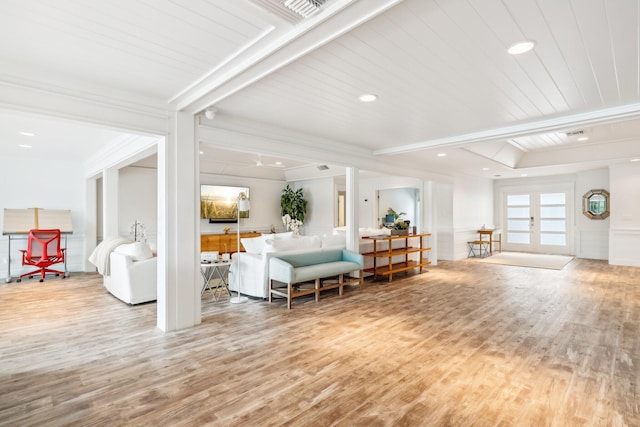 living room with french doors, light hardwood / wood-style floors, wooden ceiling, ornamental molding, and beamed ceiling