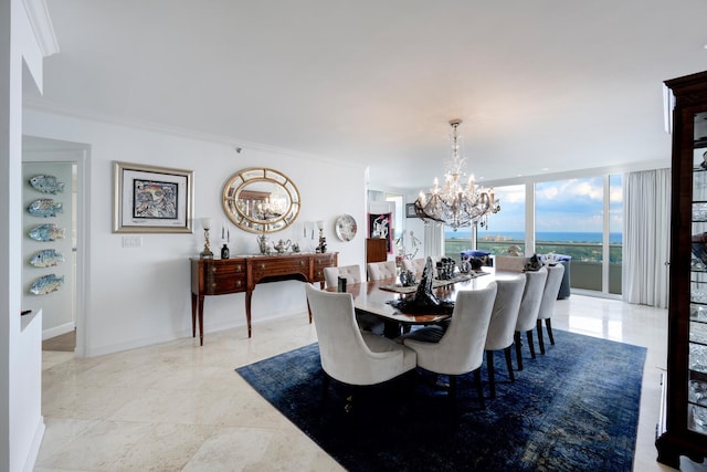 dining space featuring an inviting chandelier and ornamental molding