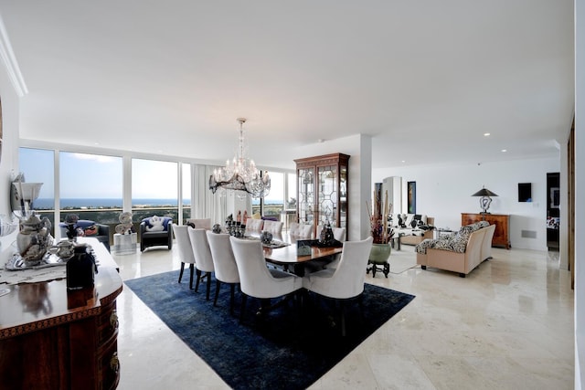 dining area with a notable chandelier and floor to ceiling windows