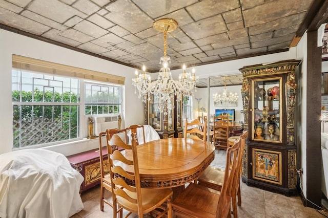 dining area featuring cooling unit, crown molding, and a chandelier