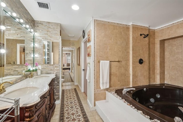 bathroom with ornamental molding, tile patterned flooring, vanity, and independent shower and bath