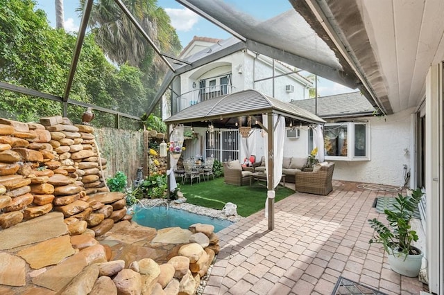 view of patio with a fenced in pool, a gazebo, an outdoor living space, and a lanai