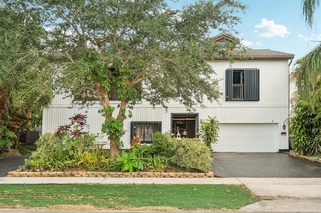 view of front of property with a garage