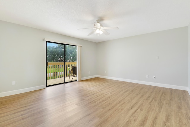 empty room featuring a textured ceiling, ceiling fan, and light hardwood / wood-style flooring