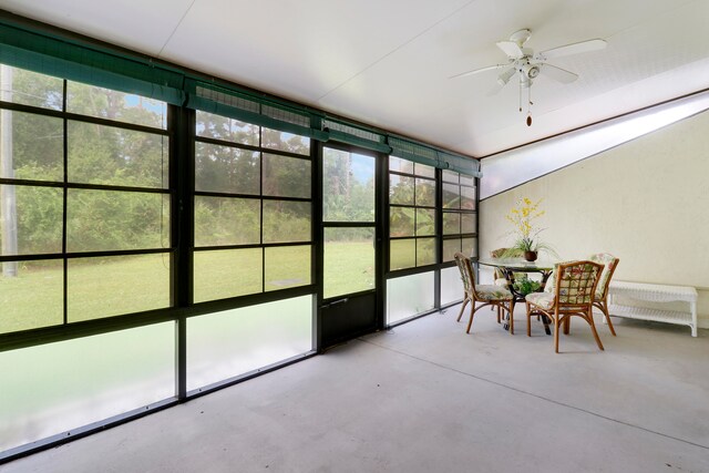 sunroom / solarium with ceiling fan