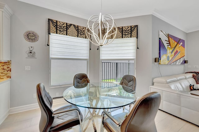 dining space with light tile patterned flooring, ornamental molding, and a notable chandelier