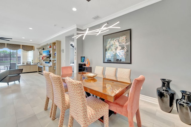 dining space featuring light tile patterned flooring and crown molding