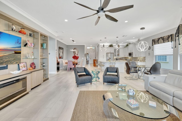 living room featuring crown molding, a notable chandelier, and light tile patterned floors