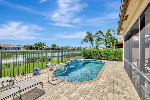 view of pool featuring a water view, pool water feature, a patio area, and a lanai