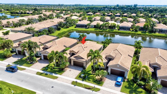 drone / aerial view featuring a water view