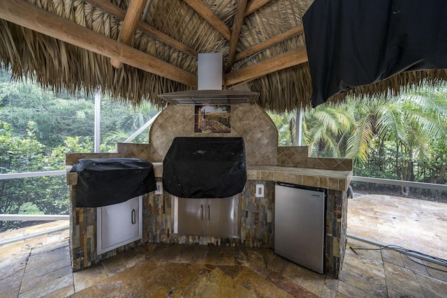 view of patio with a gazebo and area for grilling