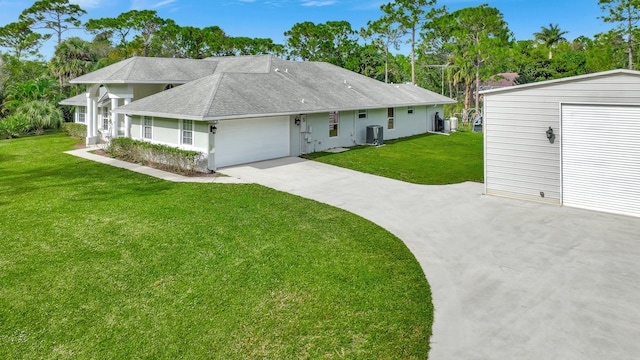 ranch-style house featuring a garage and a front yard