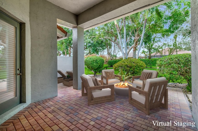 view of patio / terrace featuring a fire pit