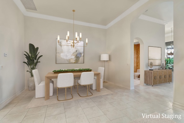 dining room with a chandelier, crown molding, and light tile patterned flooring