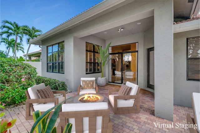 view of patio featuring a fire pit