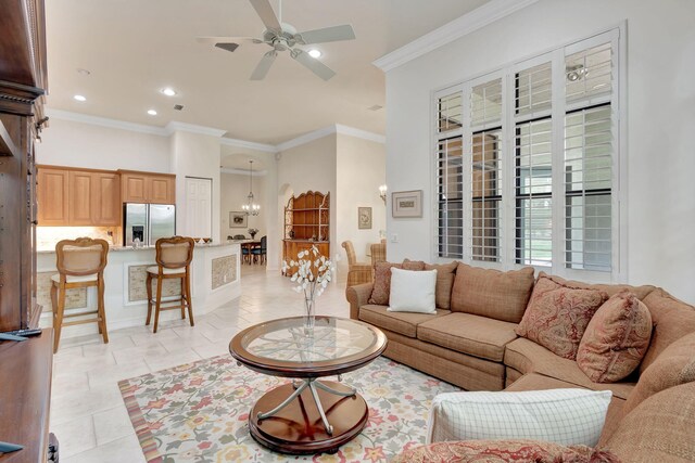 tiled living room featuring crown molding and ceiling fan