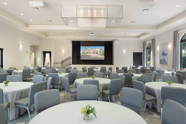 cinema room featuring a tray ceiling