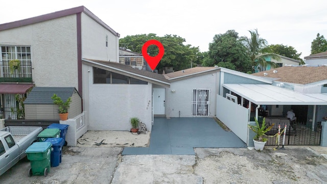 view of front of property with a patio