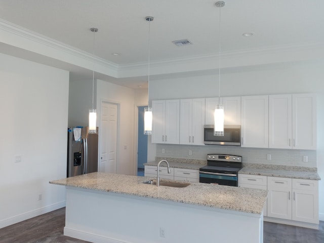 kitchen featuring hanging light fixtures, sink, stainless steel appliances, and white cabinets