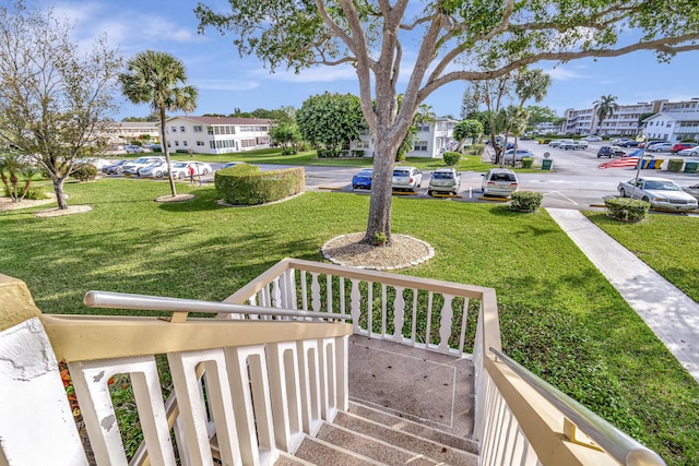 view of yard with covered porch