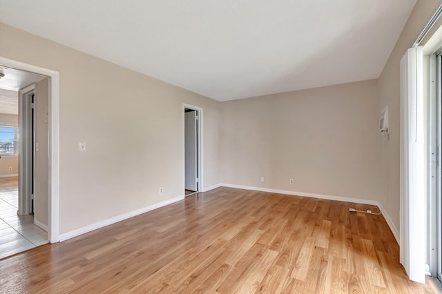 empty room with light wood-type flooring