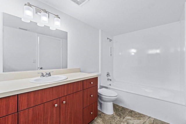 full bathroom featuring vanity, toilet, and shower / bath combination