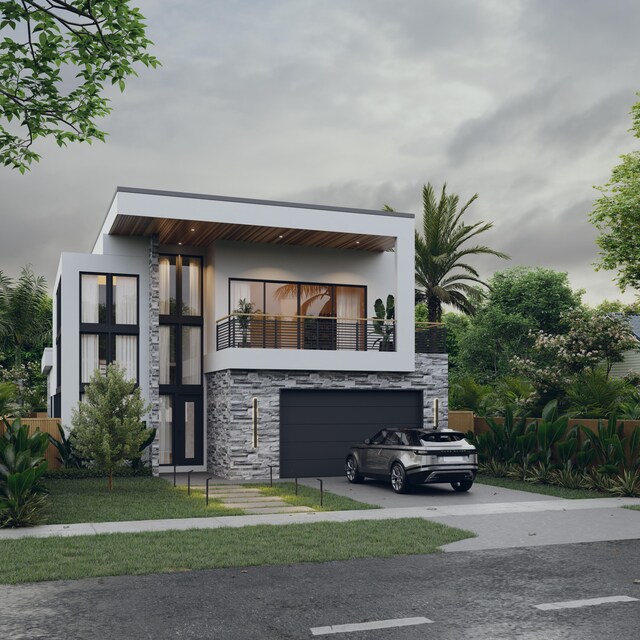 contemporary house featuring a balcony and a front yard