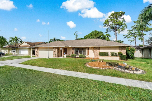 ranch-style house with a garage and a front lawn