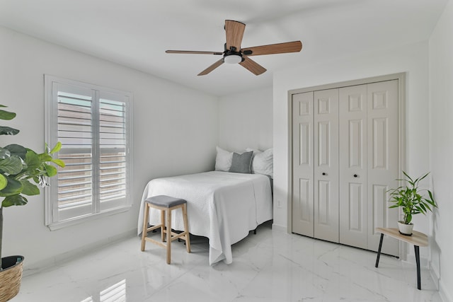 bedroom with a closet and ceiling fan