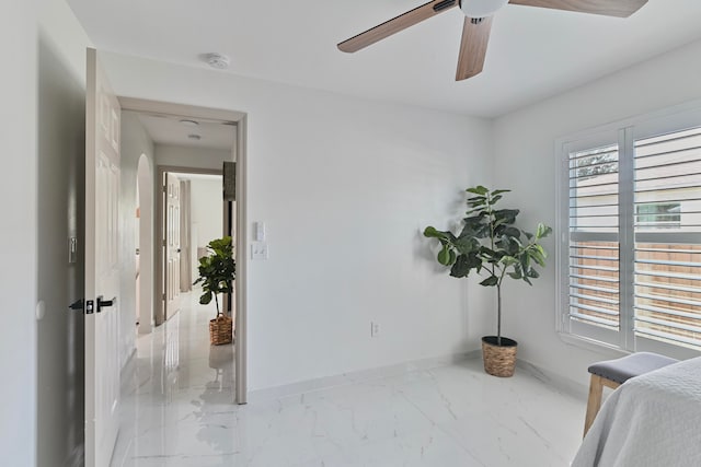 bedroom featuring ceiling fan