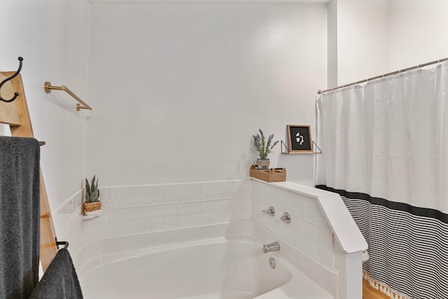 bathroom with separate shower and tub