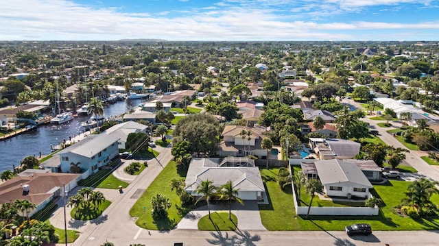 birds eye view of property featuring a water view