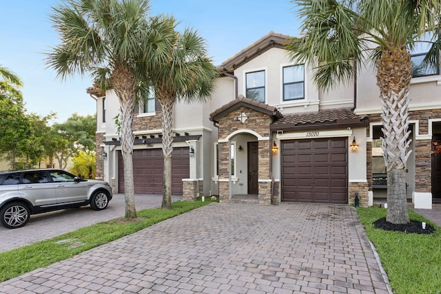 view of front of property featuring a garage