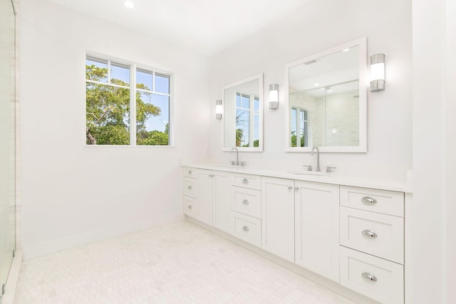 bathroom with vanity and an enclosed shower