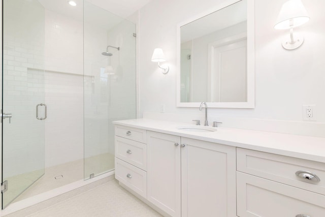 full bathroom with vanity, tile patterned flooring, a stall shower, and recessed lighting