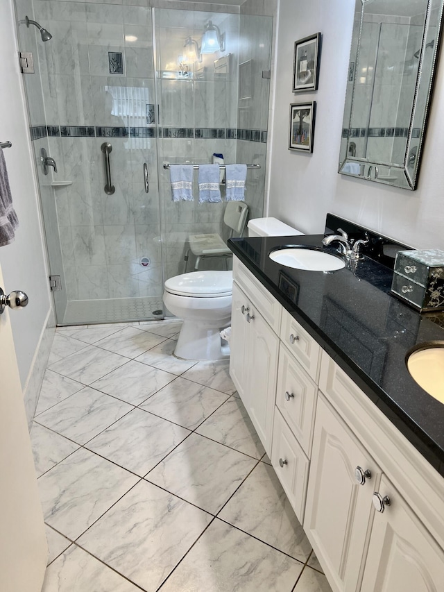 10915 Palm Lake Ave Unit 102, Boynton Beach, FL 33437 - bathroom featuring marble finish floor, a sink, double vanity, and a shower stall