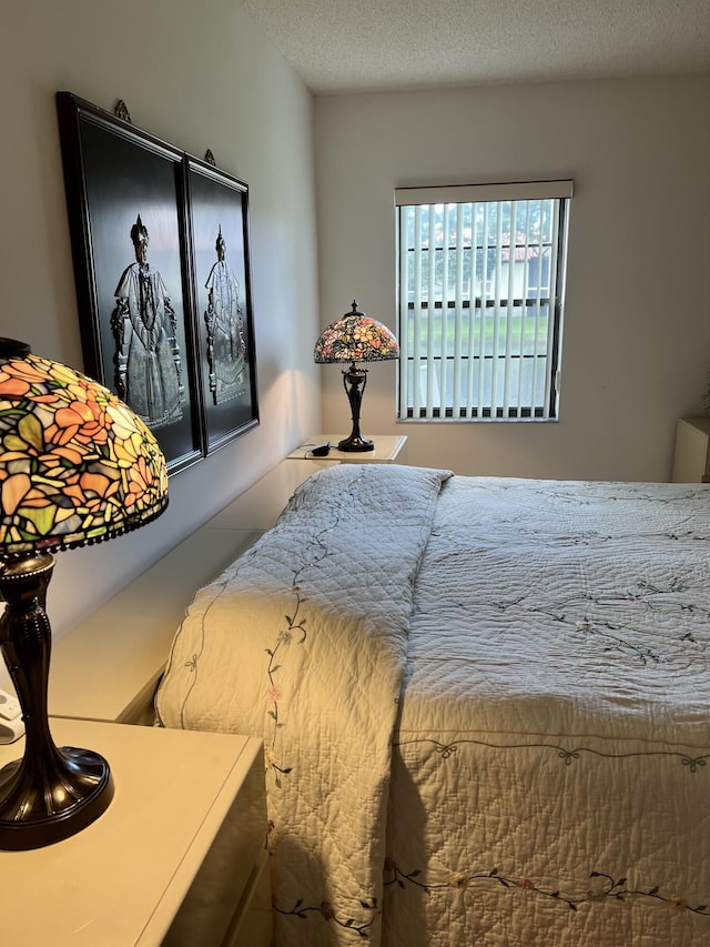 bedroom featuring a textured ceiling