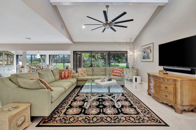 living room featuring ceiling fan and high vaulted ceiling