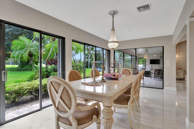 tiled dining area with plenty of natural light