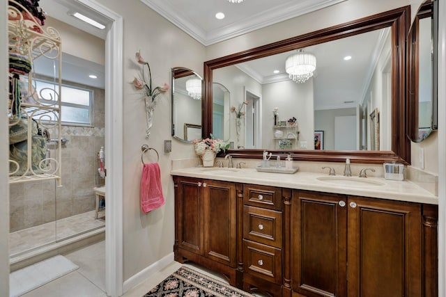 bathroom featuring tile patterned floors, a shower with shower door, crown molding, vanity, and a chandelier