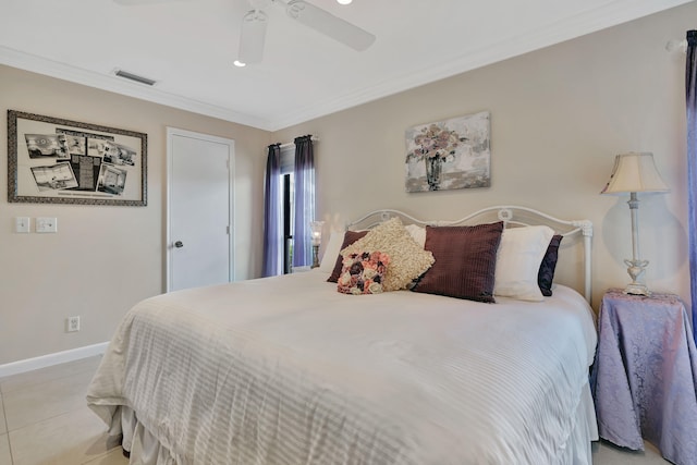 tiled bedroom with ceiling fan and crown molding