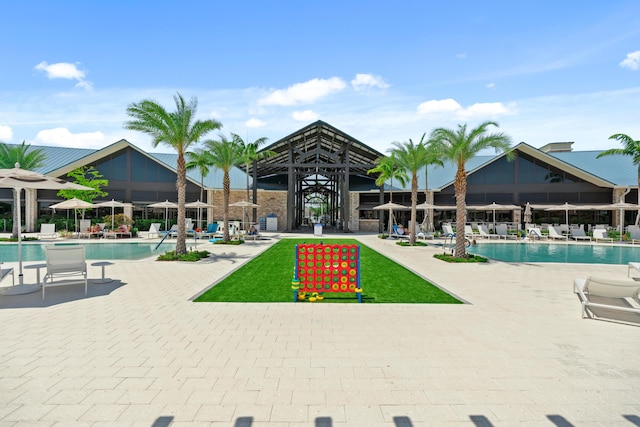 view of pool with a patio and a gazebo