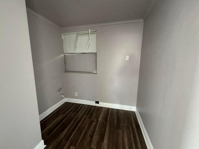 washroom featuring baseboards, crown molding, and dark wood-style floors