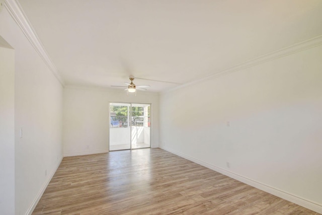 empty room with ceiling fan, ornamental molding, and light wood-type flooring