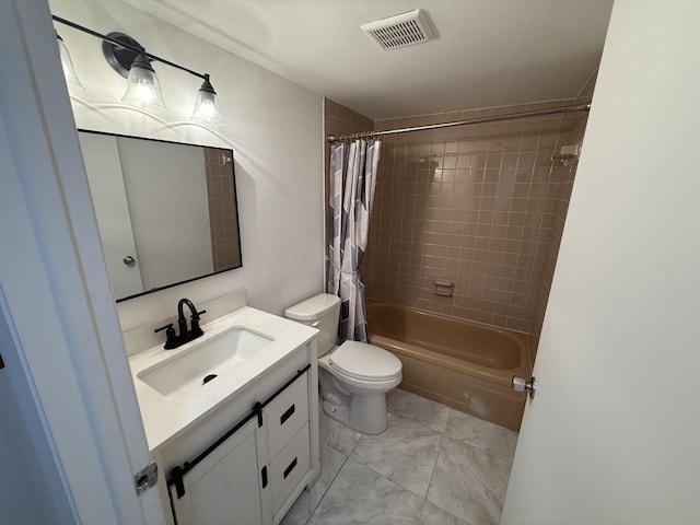 full bathroom with vanity, toilet, and shower / bath combo with shower curtain