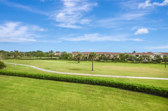 surrounding community featuring a lawn