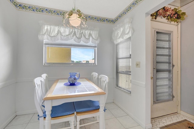 dining room with light tile patterned floors