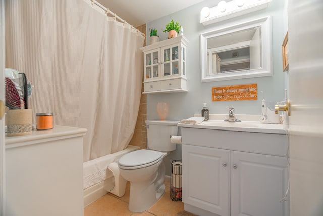 full bathroom featuring tile patterned flooring, shower / bath combo, vanity, and toilet